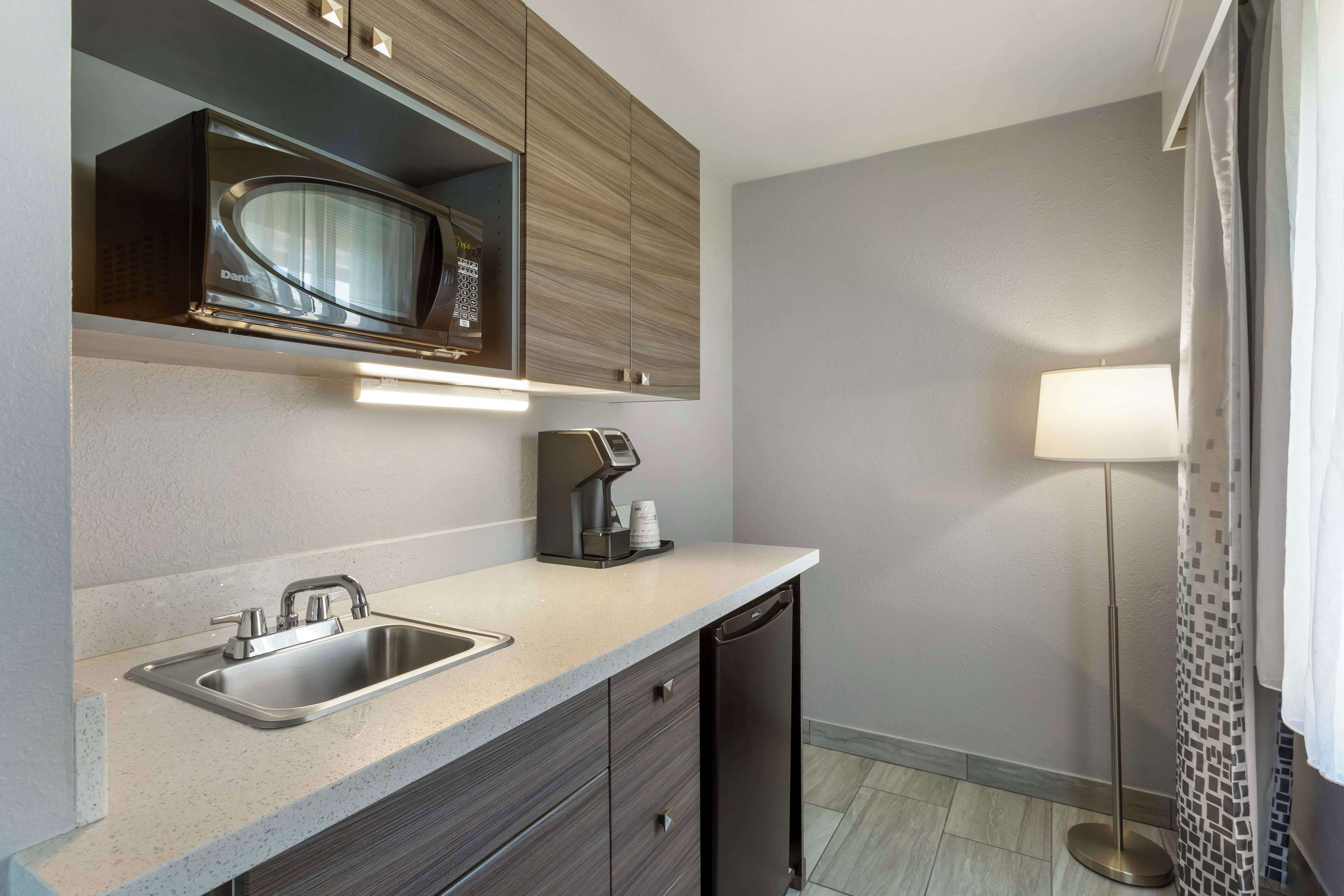 standard room, 2 queen beds, non smoking, kitchenette | premium bedding, pillow-top beds, desk, laptop workspace