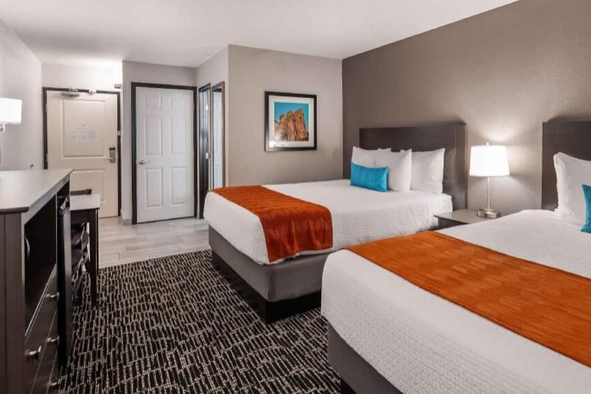 Premium bedding, pillowtop beds, desk, laptop workspace