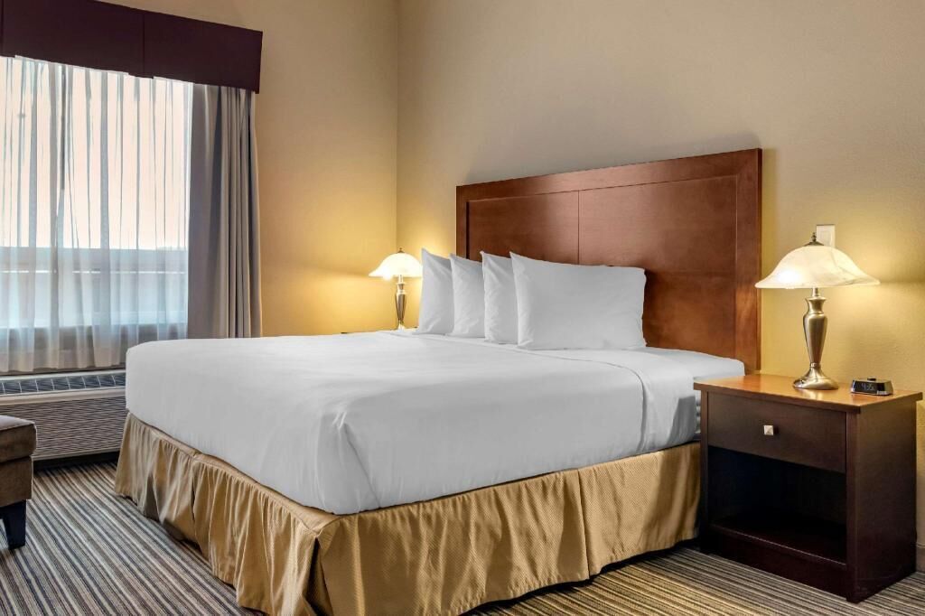 Pillowtop beds, desk, blackout drapes, iron/ironing board