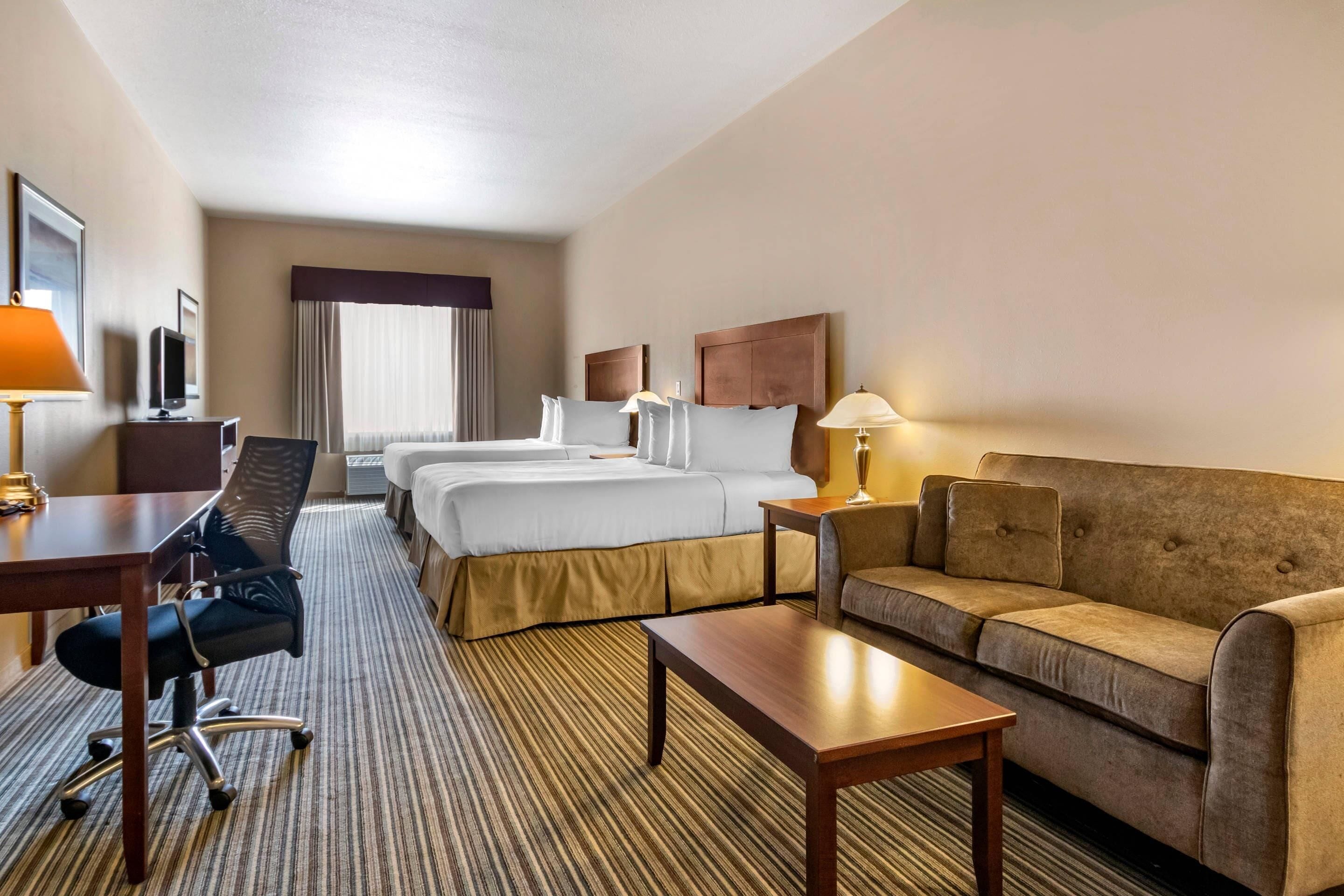 Pillow-top beds, desk, blackout curtains, iron/ironing board