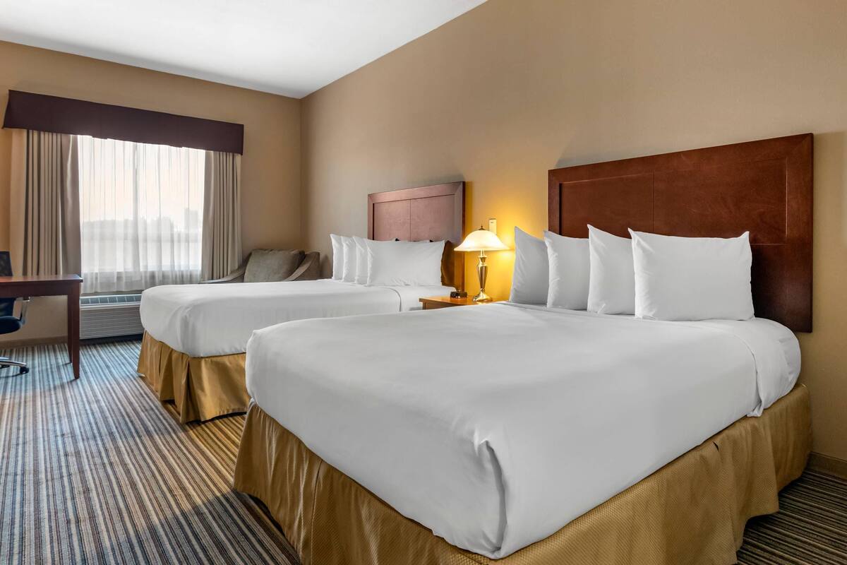 Standard Room, 2 Queen Beds, Non Smoking | Pillowtop beds, desk, blackout drapes, iron/ironing board