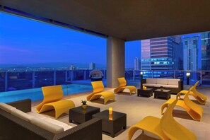 Outdoor pool, pool umbrellas, pool loungers