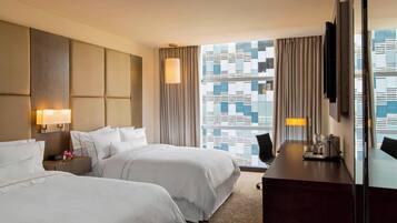 Premium bedding, pillowtop beds, minibar, in-room safe