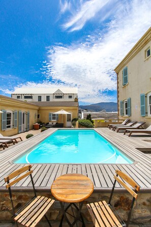 Outdoor pool, pool umbrellas, pool loungers