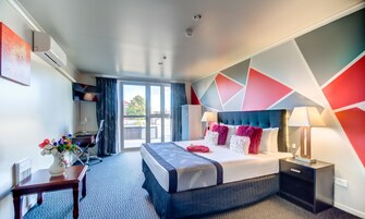 Double Room, 2 Bedrooms | Laptop workspace, blackout drapes, soundproofing, iron/ironing board