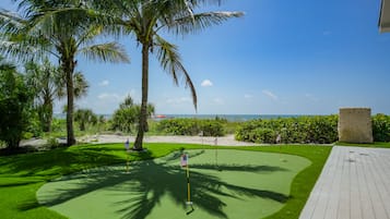 Play a round of mini-golf surrounded by lush greenery and enjoy the ocean view.