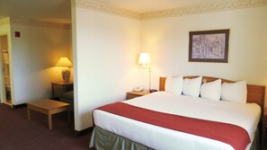 Standard Suite, 1 King Bed with Sofa bed, Jetted Tub | Blackout drapes, iron/ironing board, free WiFi, bed sheets - Peppermill Empress Inn (Centralia)