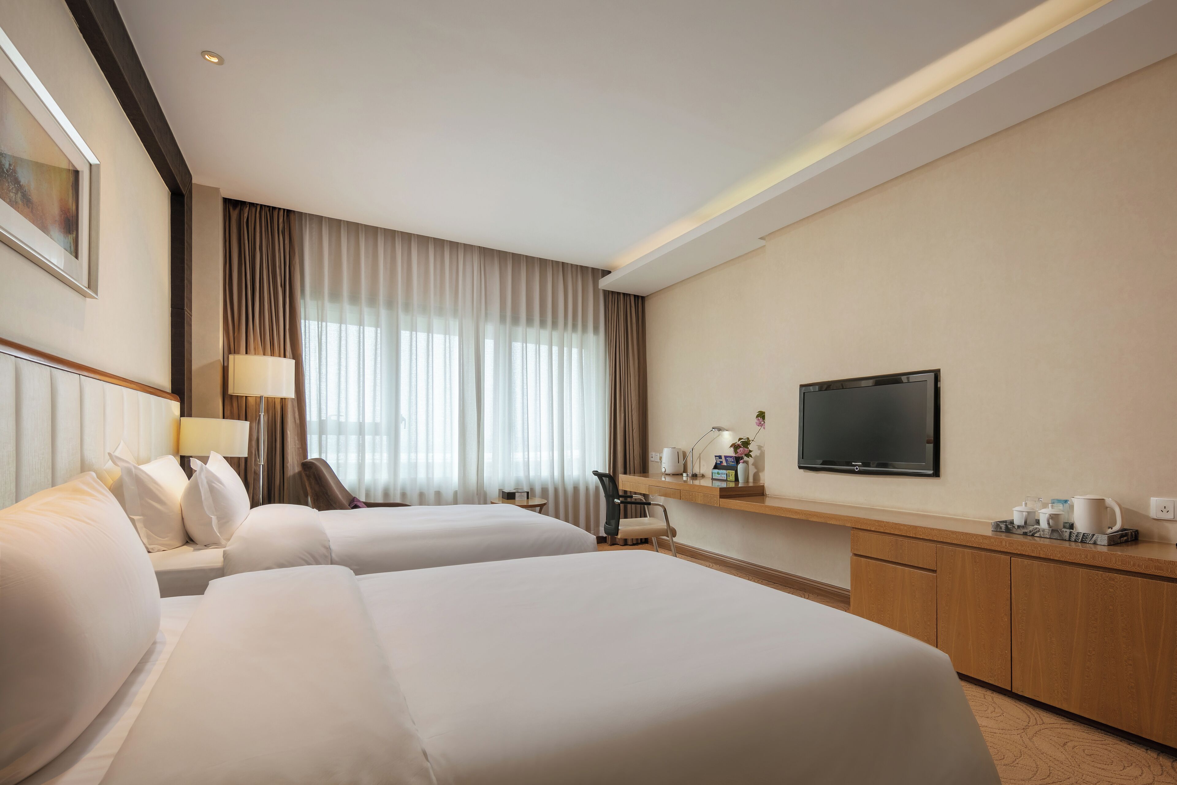 executive twin room | in-room safe, desk, blackout curtains, iron/ironing board