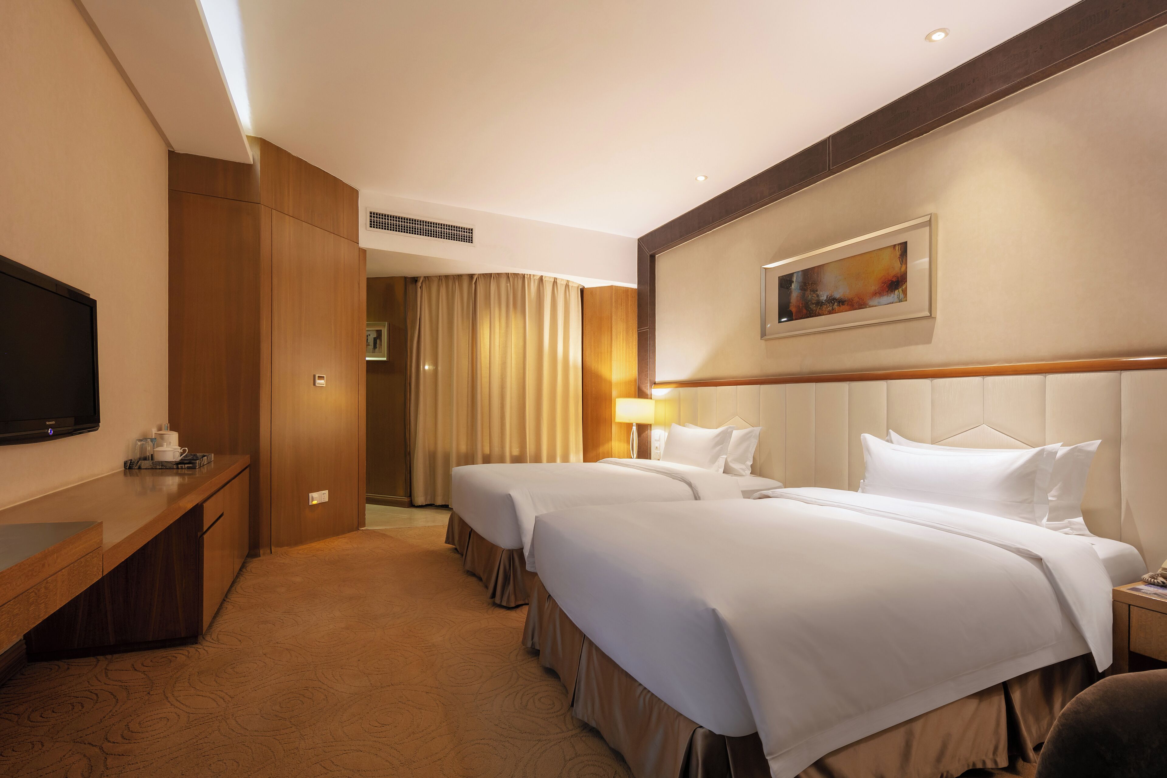 executive twin room | in-room safe, desk, blackout curtains, iron/ironing board