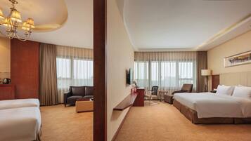 Family Superior Suite | In-room safe, desk, blackout curtains, iron/ironing board