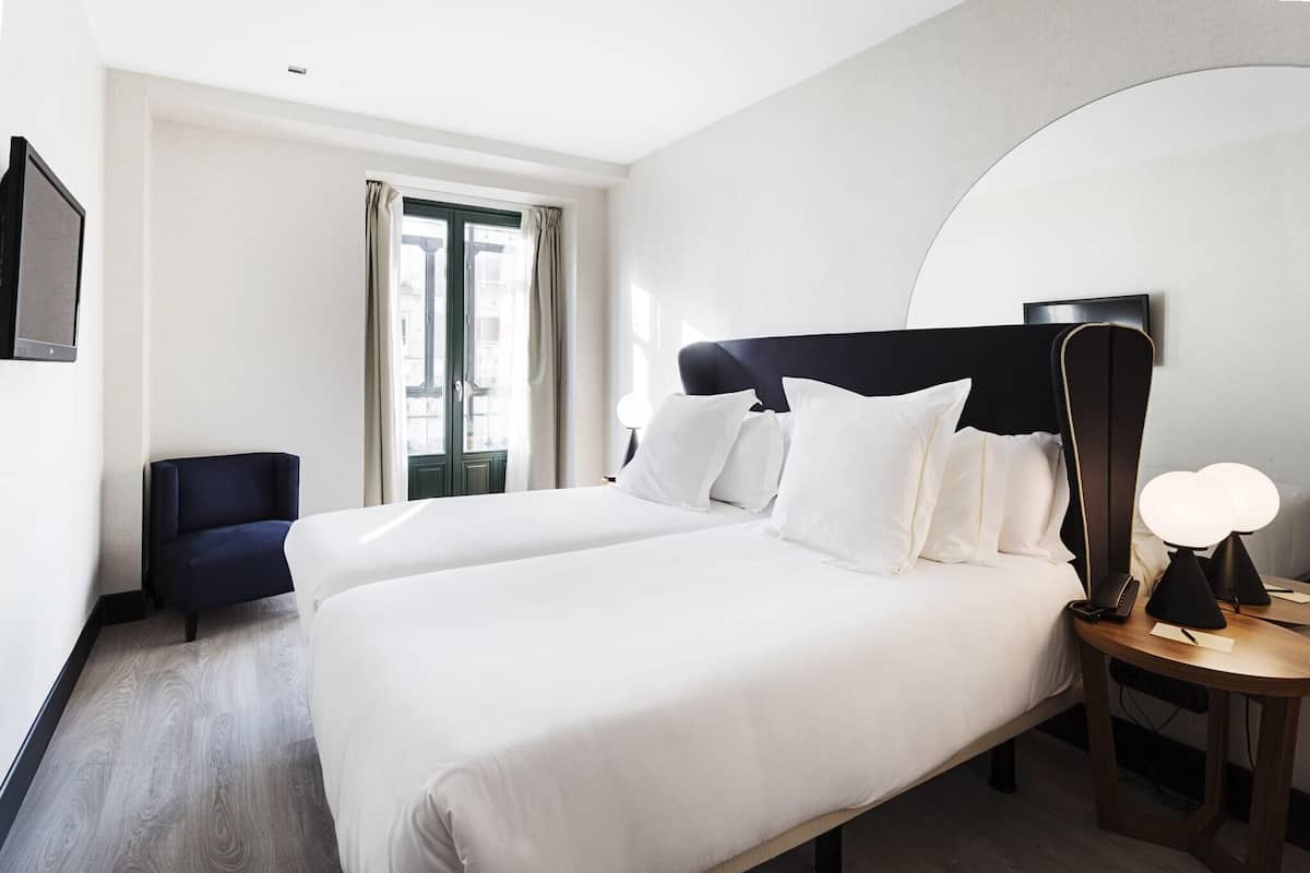 Ropa de cama de alta calidad y minibar