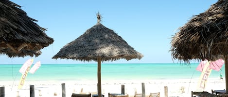 Private beach nearby, white sand, beach umbrellas, beach towels