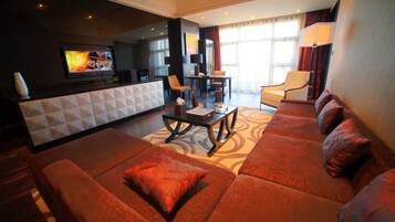 42-inch TV with cable channels, DVD player