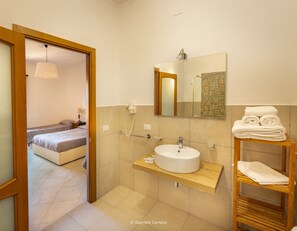 Shower, free toiletries, hair dryer, bathrobes