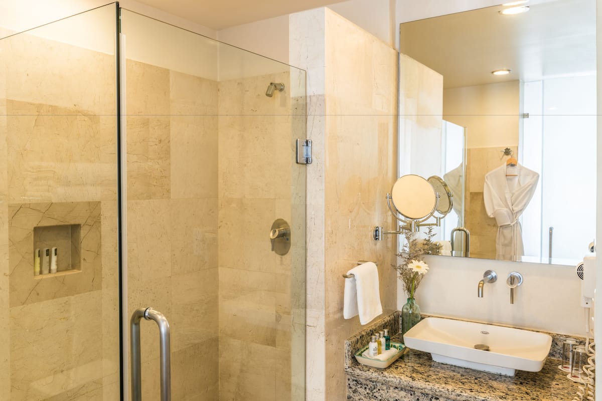 superior deluxe | bathroom | shower, free toiletries, hair dryer, towels