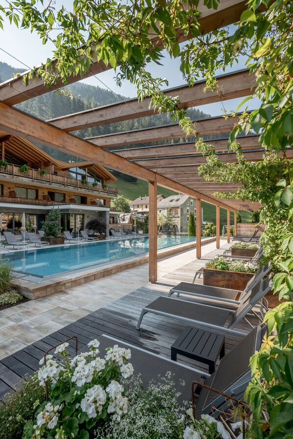 Indoor pool, seasonal outdoor pool, pool umbrellas, sun loungers