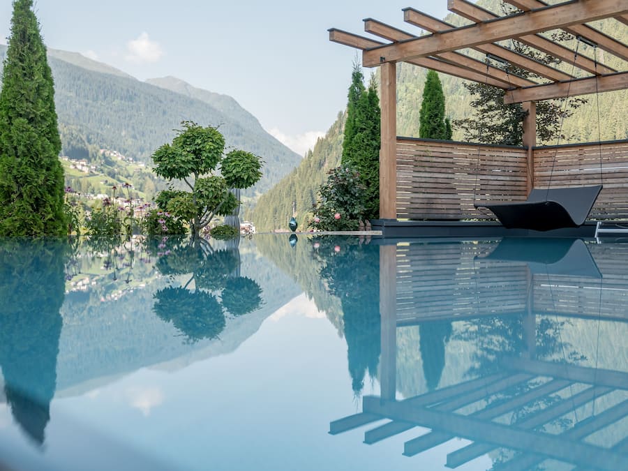 Indoor pool, seasonal outdoor pool, pool umbrellas, pool loungers