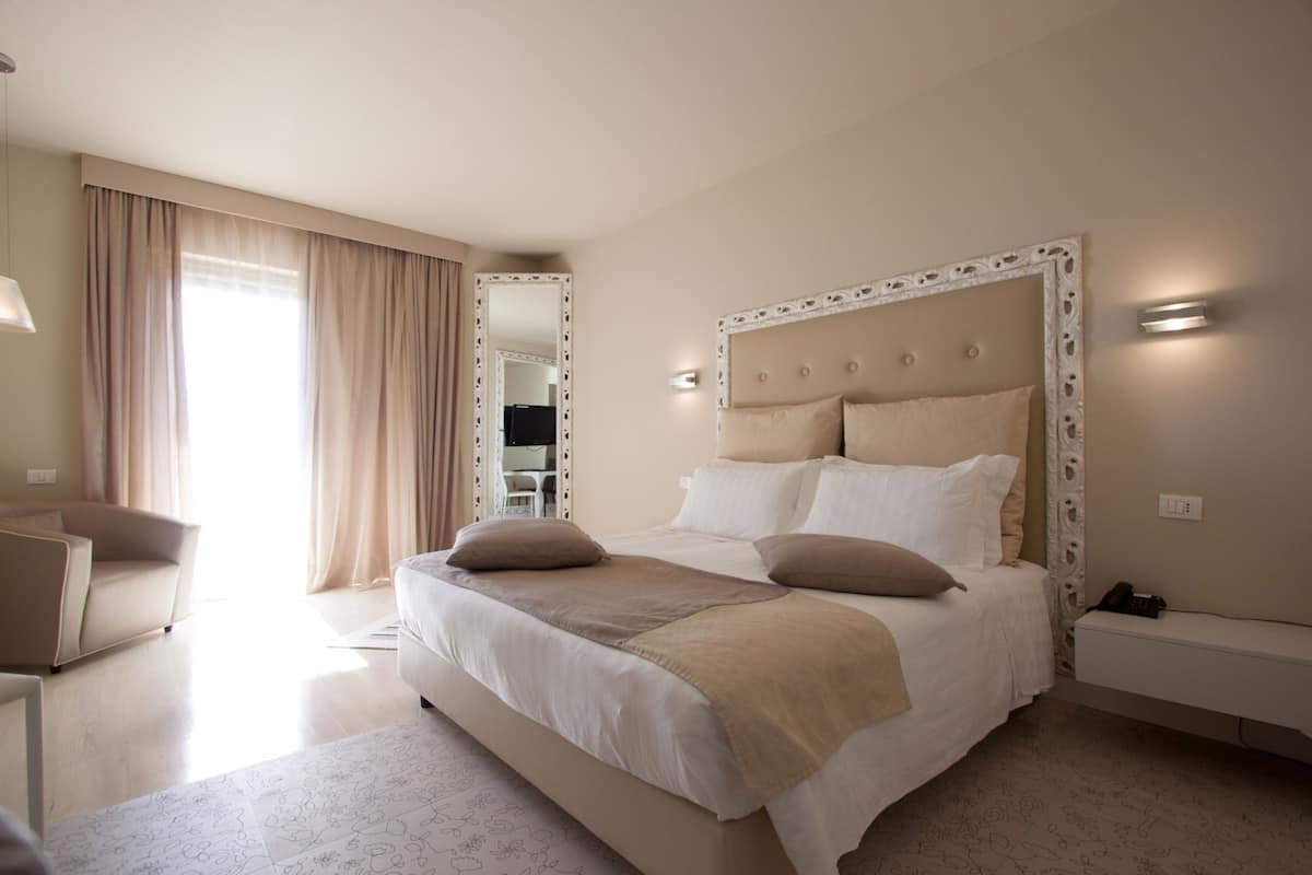 Premium bedding, down duvets, memory-foam beds, minibar