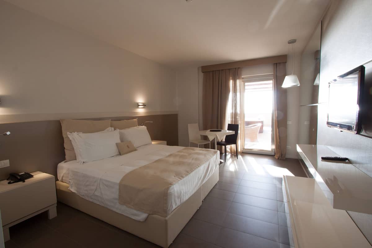 Premium bedding, down duvets, memory-foam beds, minibar