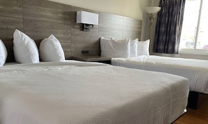 Deluxe-huone, 2 parisänkyä | Ylelliset vuodevaatteet, pimennysverhot, äänieristys, ilmainen Wi-Fi