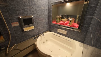 Standard Room, 1 King Bed (Couples Hotel) | Bathroom | Separate tub and shower, free toiletries, hair dryer, bathrobes