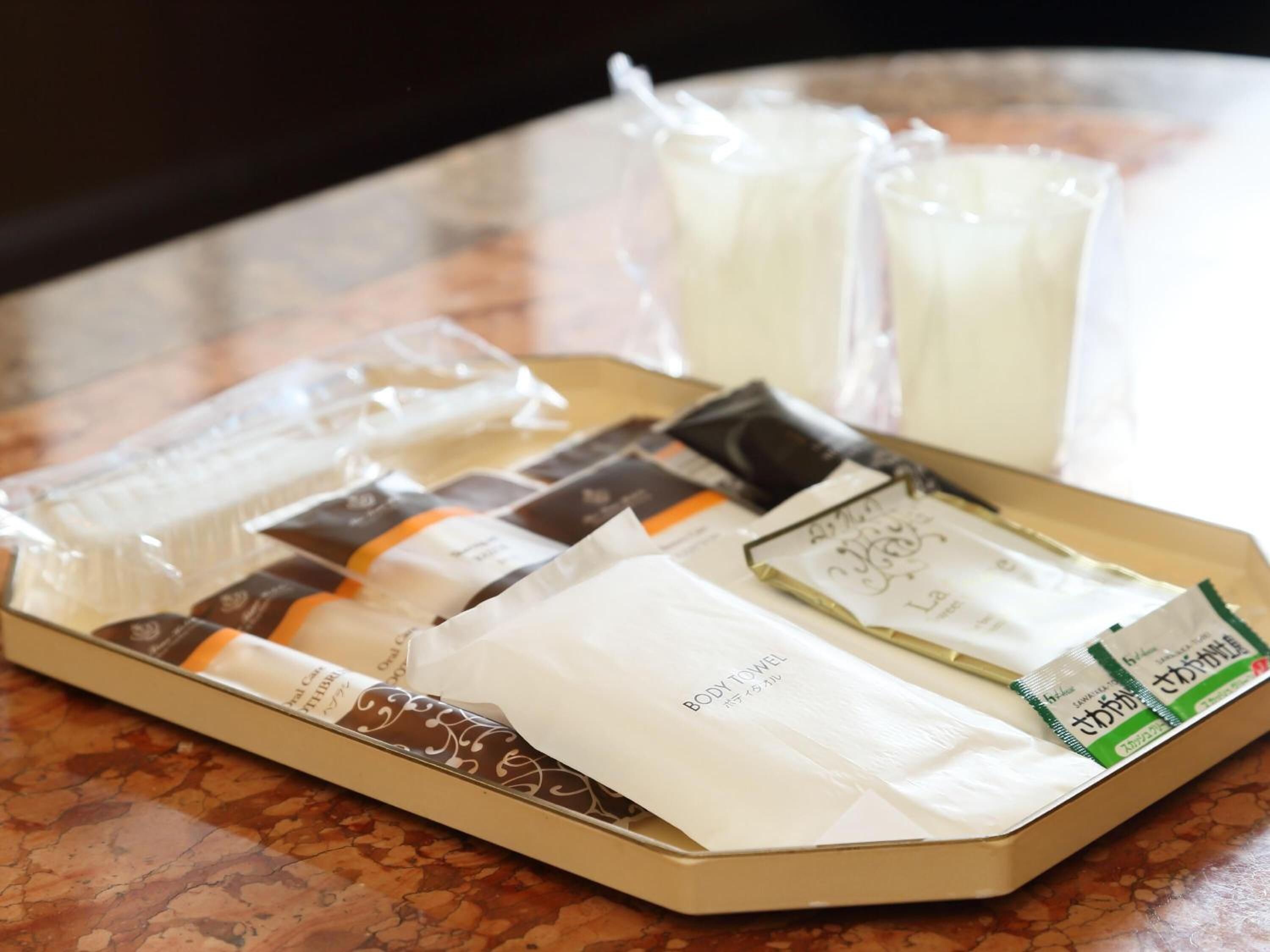 Separate tub and shower, free toiletries, hair dryer, slippers