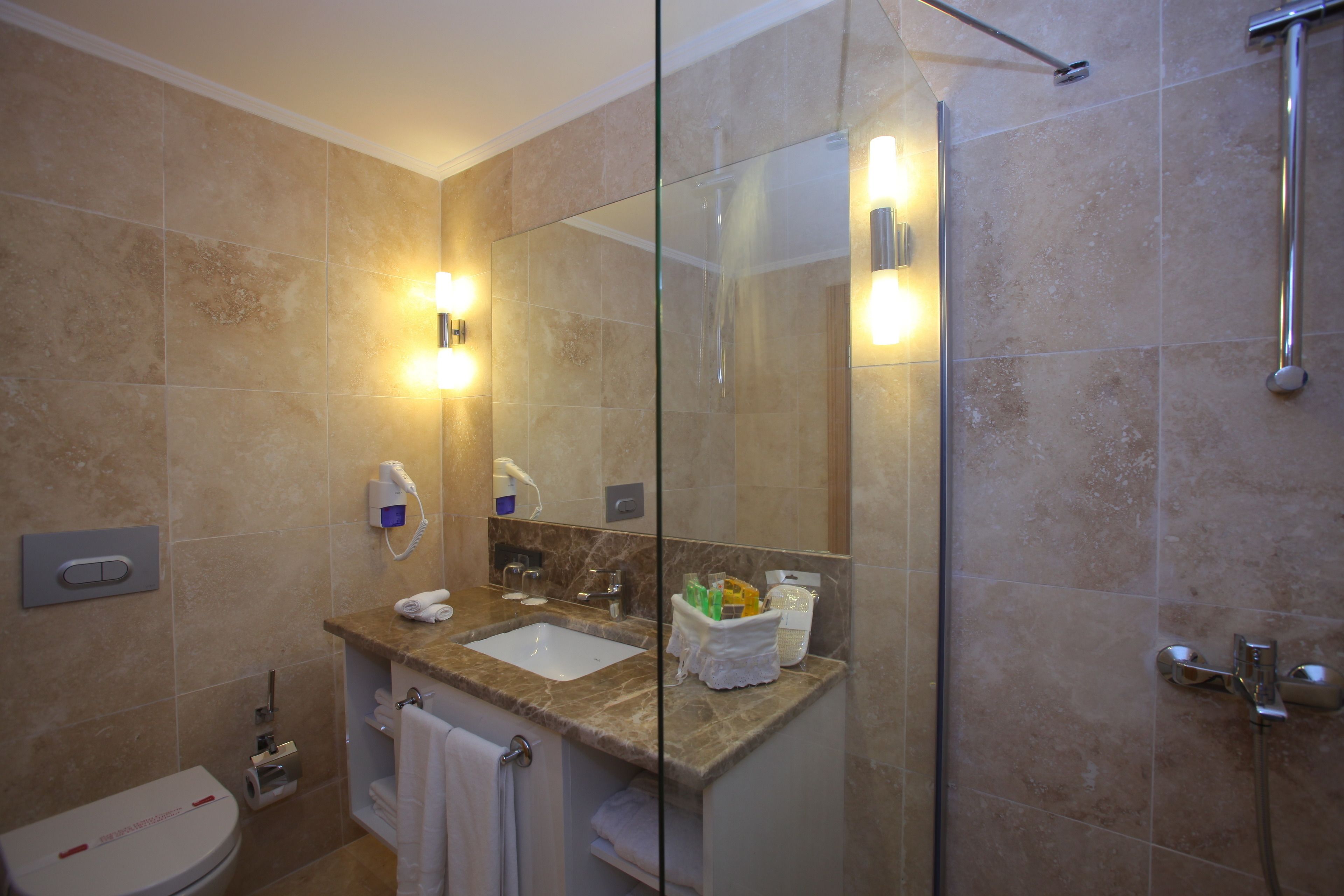 club room sea view | bathroom | shower, free toiletries, hair dryer, towels