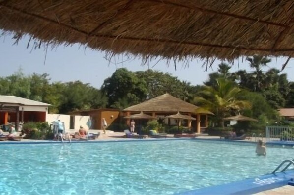 Outdoor pool, pool umbrellas, sun loungers