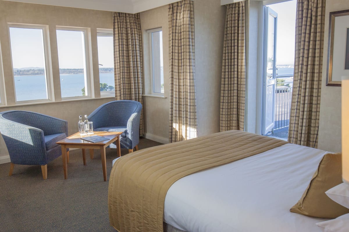 double room, balcony, harbour view | desk, iron/ironing board, cots/infant beds, free wifi