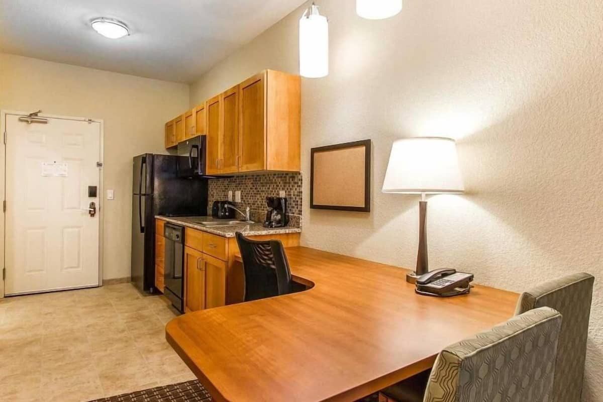 full-sized fridge, microwave, stovetop, dishwasher