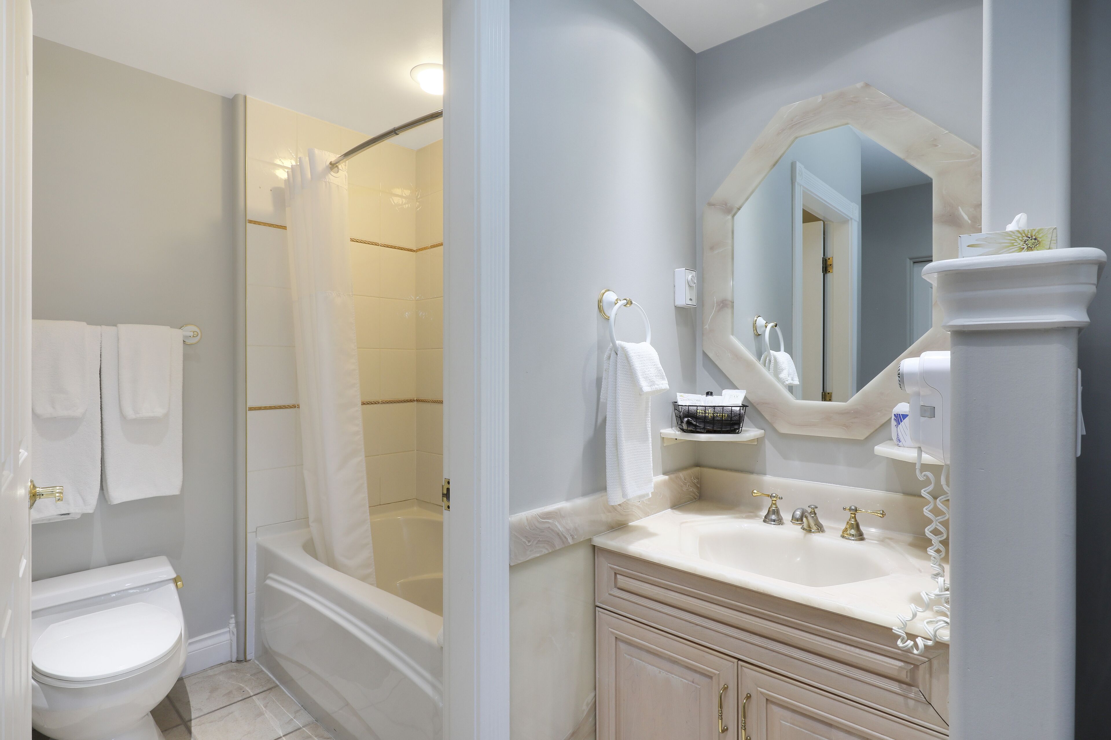 shower, free toiletries, hair dryer, towels