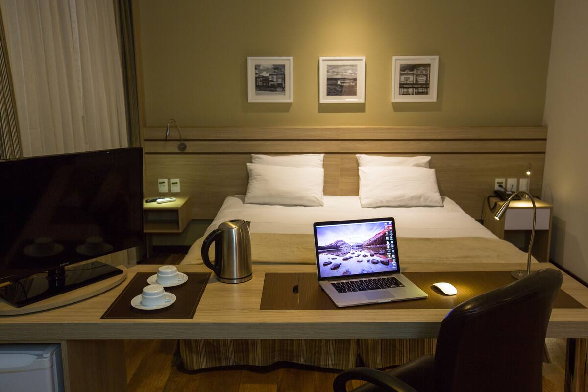 Superior Double Room | Minibar, in-room safe, desk, blackout drapes