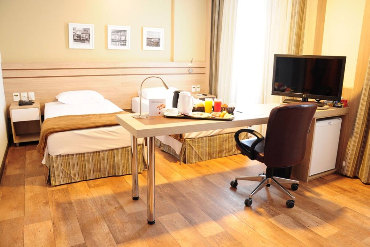 Superior Twin Room | Minibar, in-room safe, desk, blackout drapes