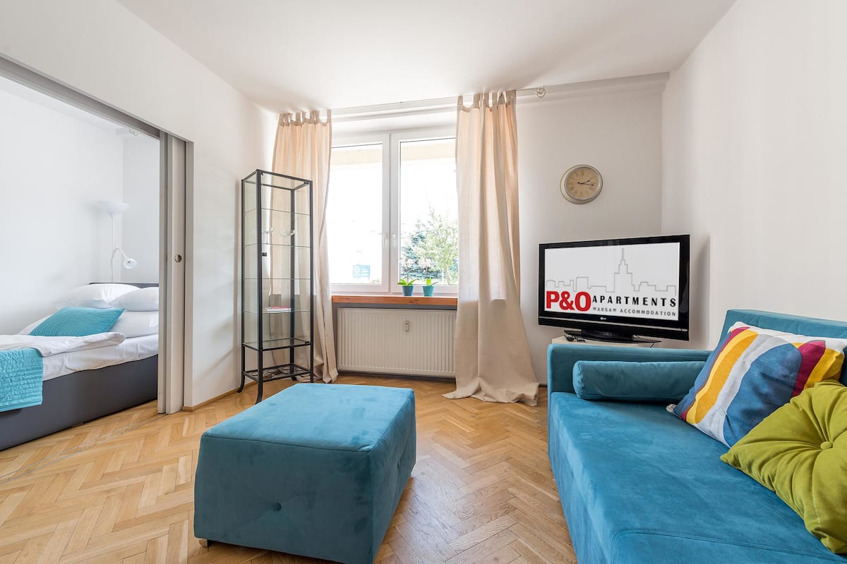 Apartment, 1 Bedroom (23 Miodowa Street) | Living area | 21-inch TV with cable channels