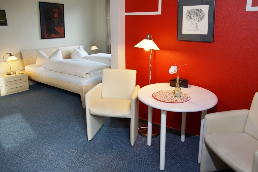 double room | living area | flat-screen tv