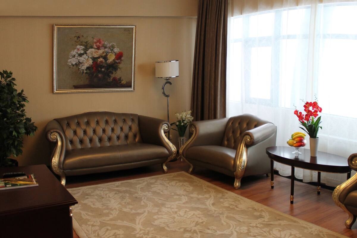 Luxe suite | Woonruimte | Flatscreentelevisie