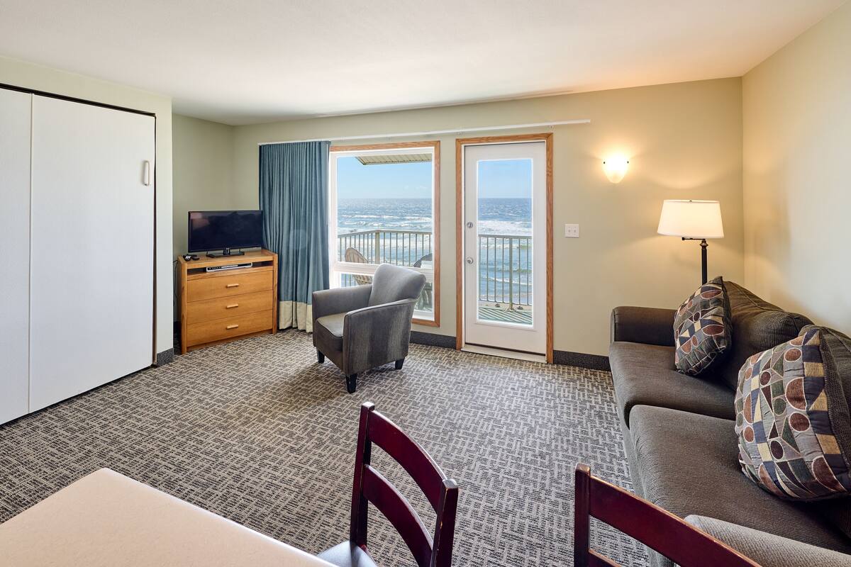 Family Suite, 1 Bedroom, Balcony, Ocean View | Living area | TV, DVD player, pay movies