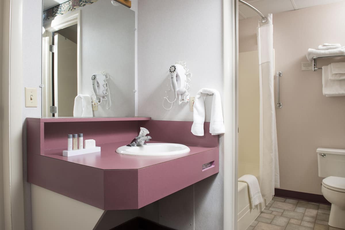 standard room, 2 queen beds - pool building | bathroom | shower, towels