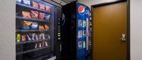 A vending machine with snacks and a Pepsi dispenser.