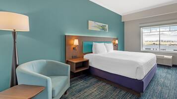Suite, 1 King Bed, Non Smoking, Refrigerator & Microwave (with Sofabed) | Pillowtop beds, desk, laptop workspace, iron/ironing board