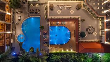 Outdoor pool, pool umbrellas, sun loungers
