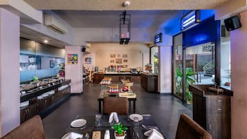 Breakfast, lunch, dinner served; international cuisine, pool views