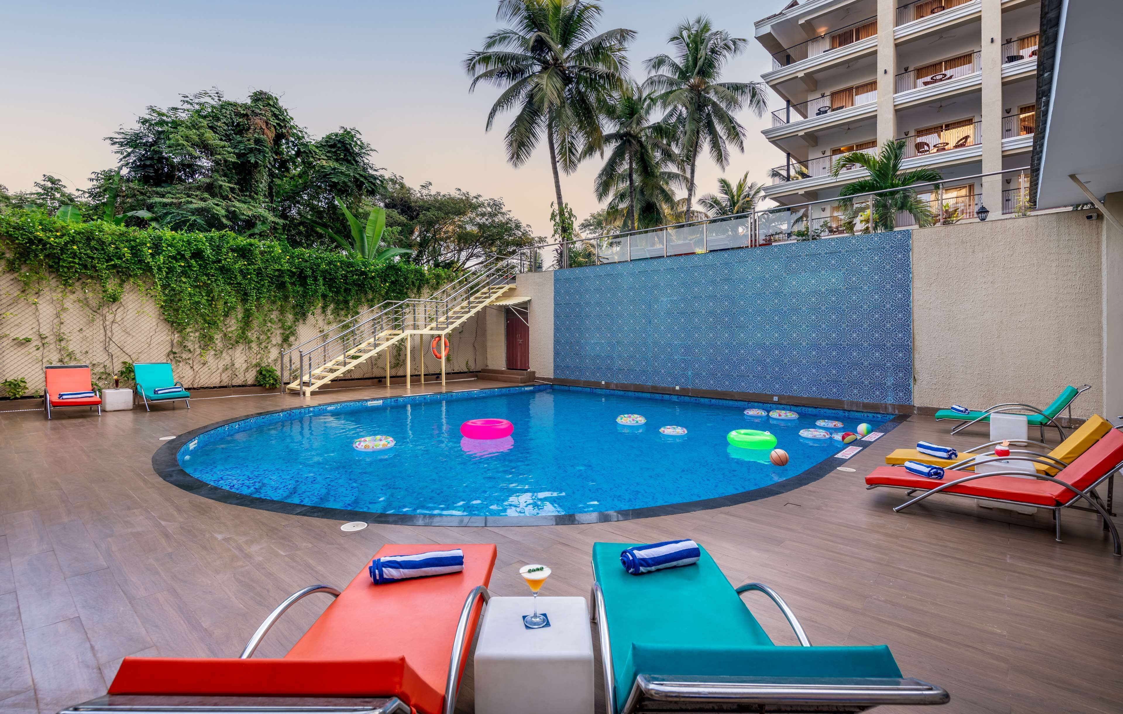 Outdoor pool, pool umbrellas, pool loungers