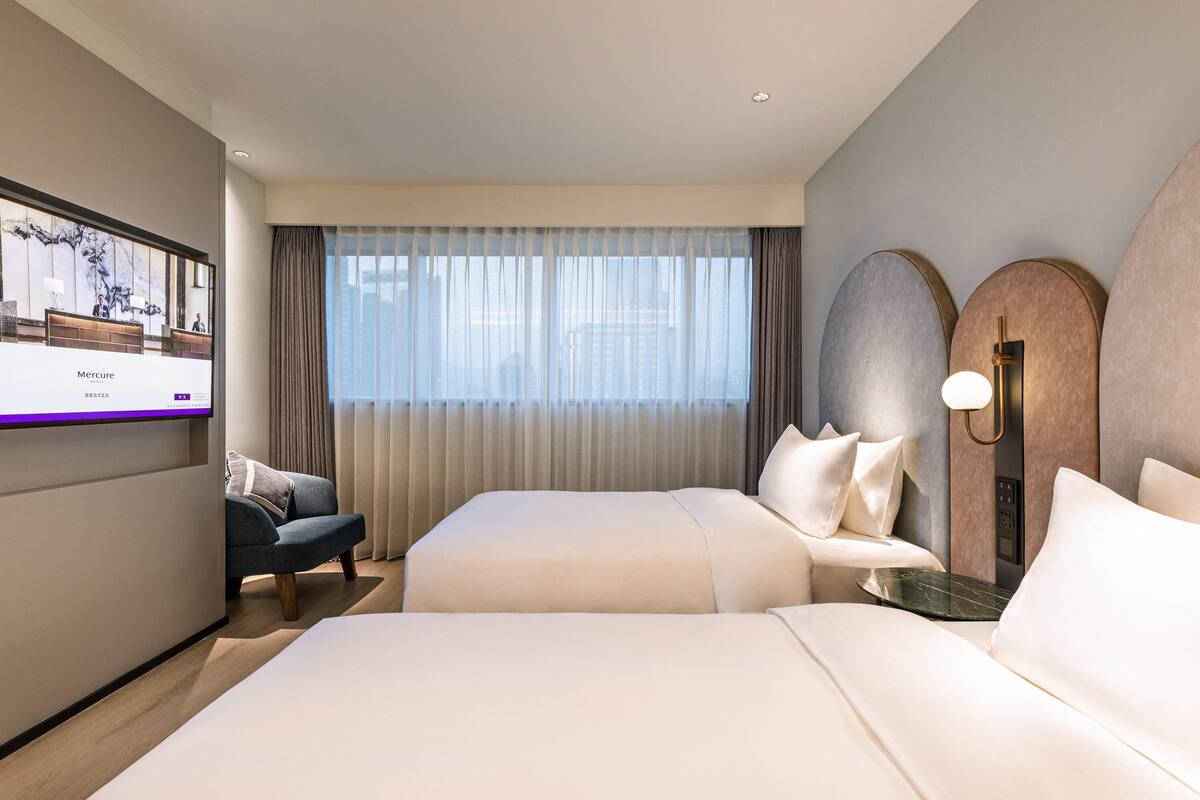 Phòng Superior, 2 giường đơn | Bộ đồ giường cao cấp, chăn bông, nệm có lớp đệm bông, minibar 