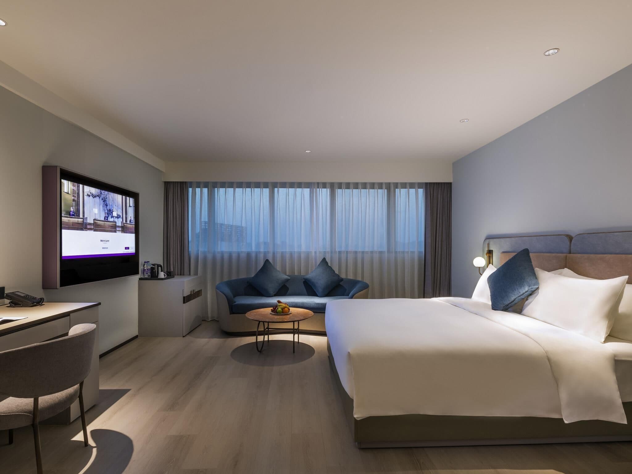 Habitación Deluxe, 1 cama King size | Ropa de cama de alta calidad, edredón, camas con pillow-top y minibar 