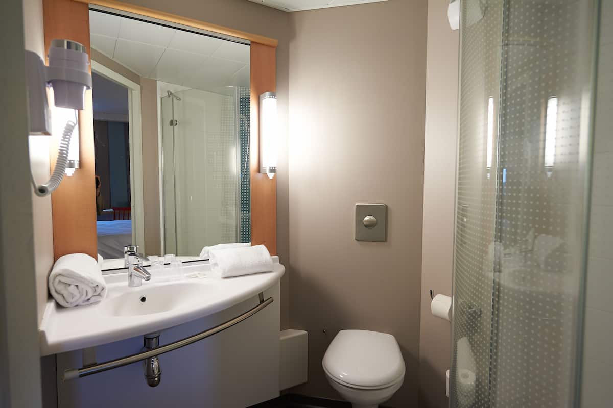 shower, eco-friendly toiletries, hair dryer, towels