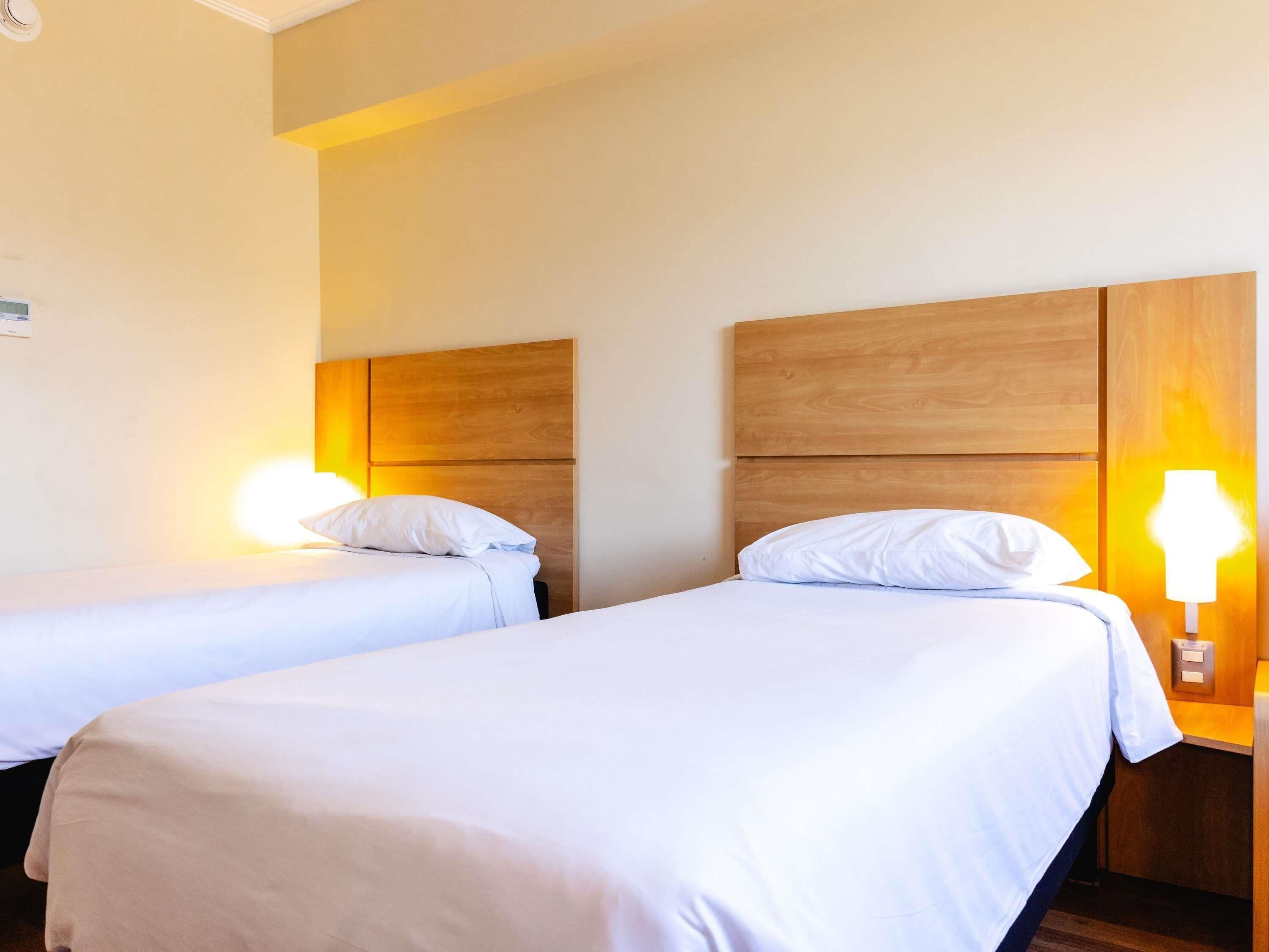 Standard Twin Room, 2 Twin Beds | Down comforters, in-room safe, desk, soundproofing
