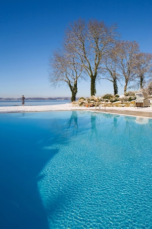 Indoor pool, outdoor pool, pool umbrellas, sun loungers