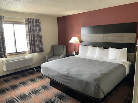 Room, 1 King Bed, Non Smoking | Desk, laptop workspace, iron/ironing board, rollaway beds. Baymont by Wyndham Waupun