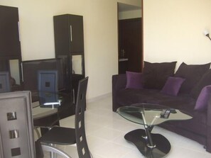 Condo, 2 Bedrooms | Living room | 42-inch plasma TV with satellite channels, TV, video-game console - The 3Sis Apartments (Hurghada)